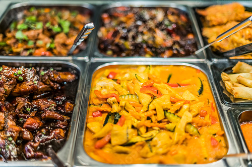 Asian food sold in a shopping mall food court