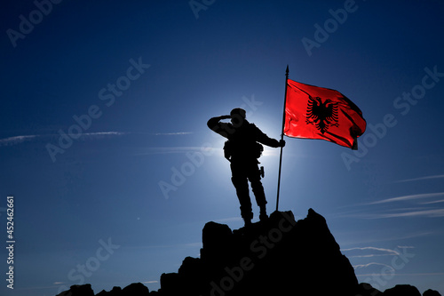 Soldier with the Albanian flag
