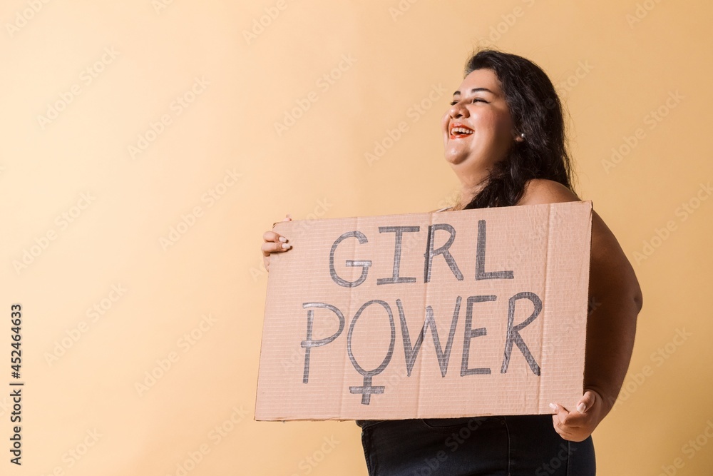 cheerful plus size latin american woman looking away with cheerful plus size latin american woman looking away with