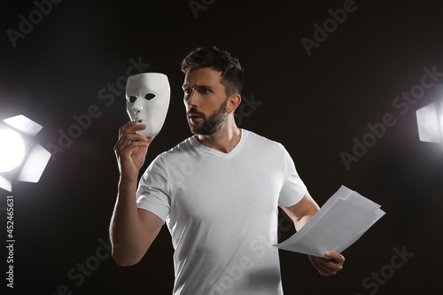 Professional actor rehearsing on stage in theatre photo