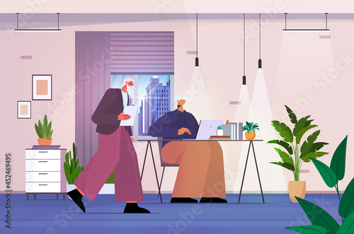 senior businesspeople couple using digital gadgets business people working in modern office
