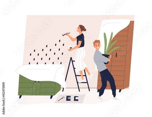 Family repairing home interior together. Young happy couple of man and woman ...