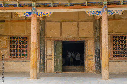 The exterior of the Mogao Grottos in Dunhuang, Gansu province, China. photo