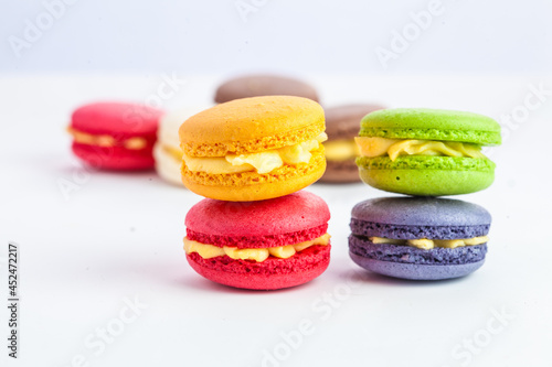 many macaroons on white table