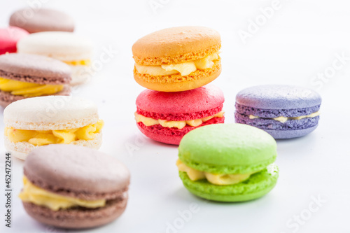 many macaroons on white table