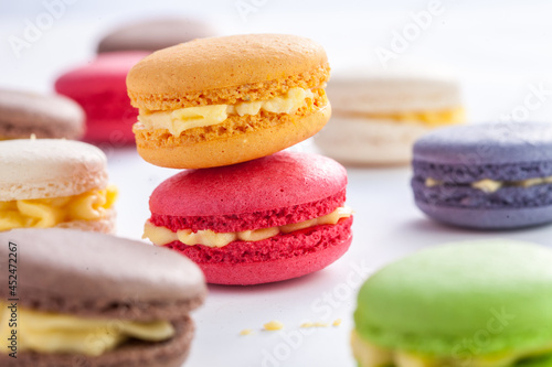 many macaroons on white table