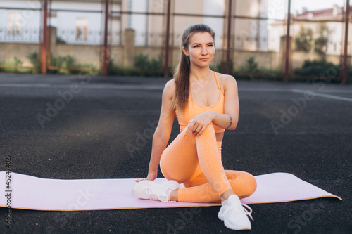 Fitness sporty woman training outdoors. Sports, work out, healthy lifestyle concept © Andreshkova Nastya