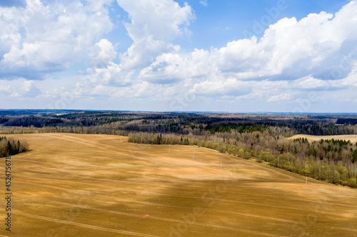 Aerial view of agricultural landscape with fields in spring season.