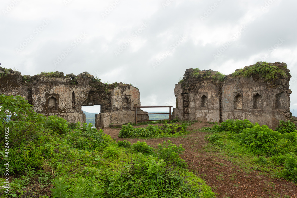 Walls of Hatgad fort in ruins, Nashik, Maharashtra, India.
