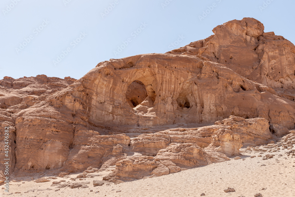 Fantastic rock - Arch - formed as a result of centuries-old washing out of rocks by groundwater in Timna National Park near Eilat, southern Israel. Fantastic rock - Arch - formed as a result of centuries-old washing out of rocks by groundwater in Timna National Park near Eilat, southern Israel.