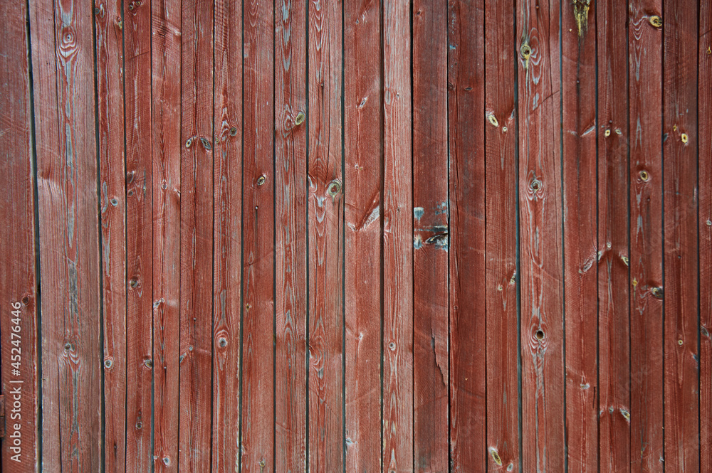 Background from old boards with knots painted in red
Background from old boards with knots painted in red