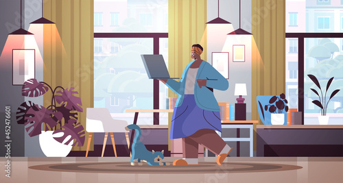 senior woman using laptop grandmother relaxing at home social media network online communication