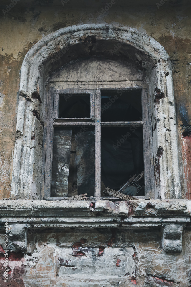 vertical view of abandoned house window vertical view of abandoned house window