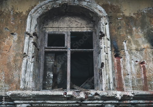 old and scary window of abandoned house