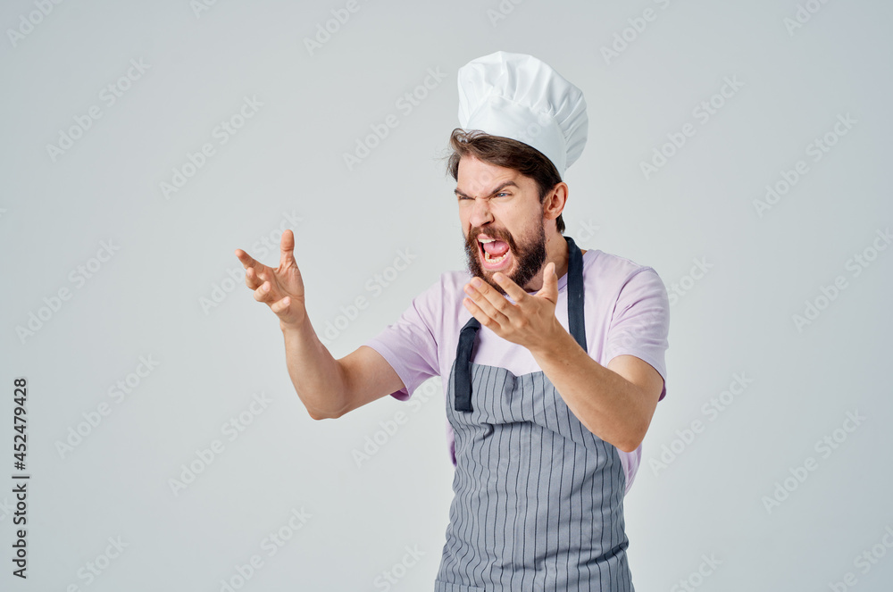 man in aprons cooking professional work service man in aprons cooking professional work service