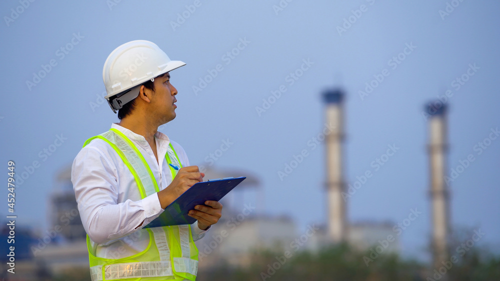 Male Engineer working on site at factory industry Male Engineer working on site at factory industry