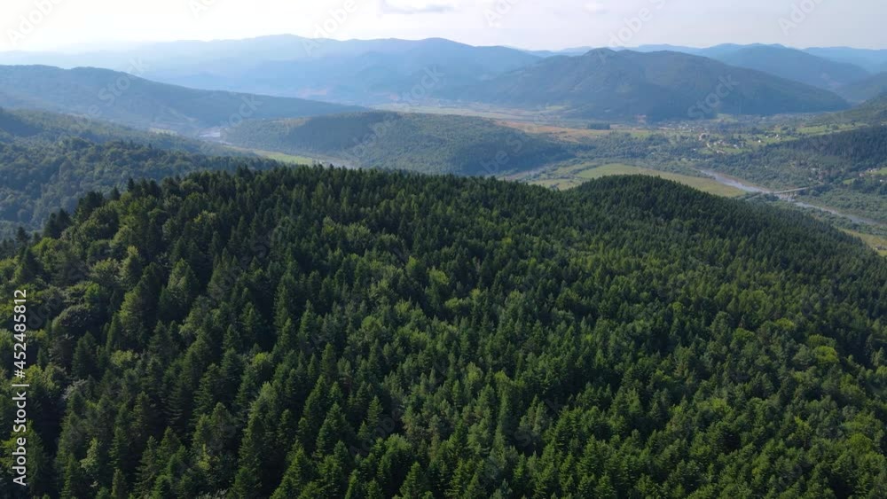 Сinematic aerial view of the endless mountains and forests of southern Slovenia. Drone flying through the forest Сinematic aerial view of the endless mountains and forests of southern Slovenia. Drone flying through the forest
