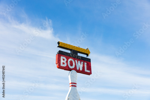 Vintage sign for bowling alley, Bowl white lettering on red background photo