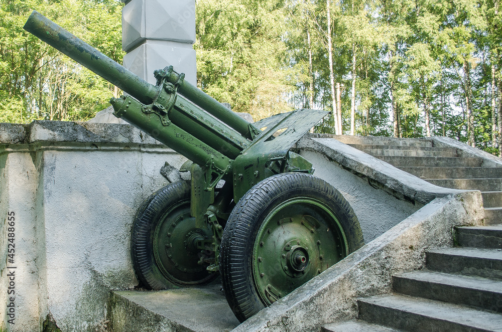 Old green artillery gun, Mazeikiai, Lithuania.