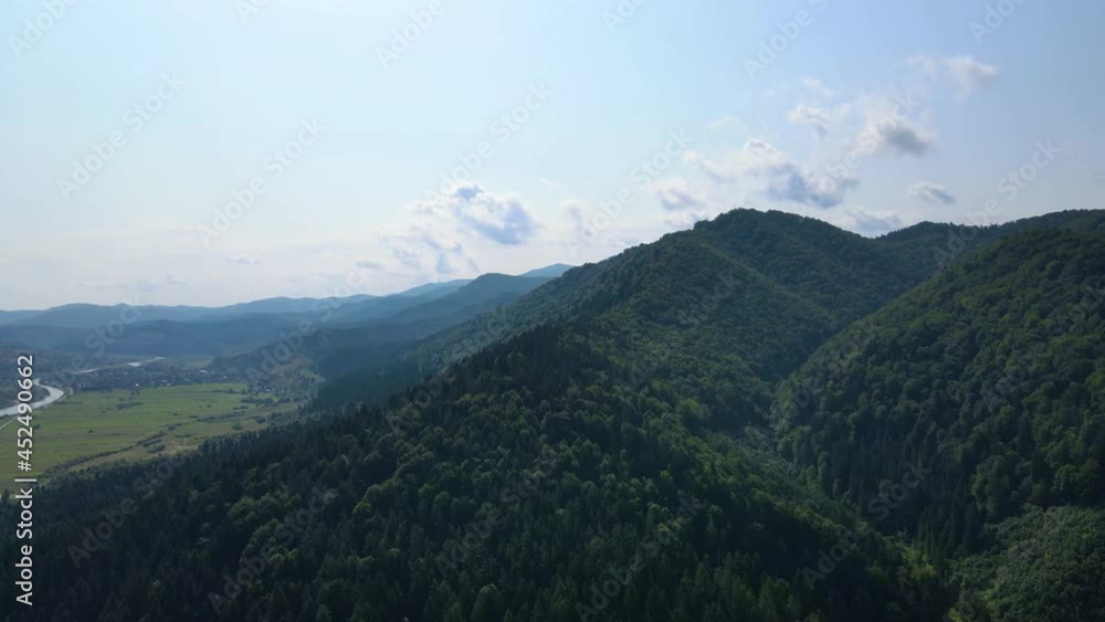 Сinematic aerial view of the endless mountains and forests of southern Slovenia. Drone flying through the forest Сinematic aerial view of the endless mountains and forests of southern Slovenia. Drone flying through the forest