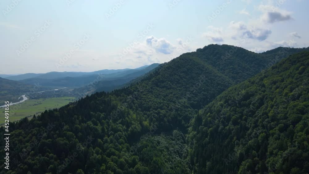 Сinematic aerial view of the endless mountains and forests of southern Slovenia. Drone flying through the forest Сinematic aerial view of the endless mountains and forests of southern Slovenia. Drone flying through the forest