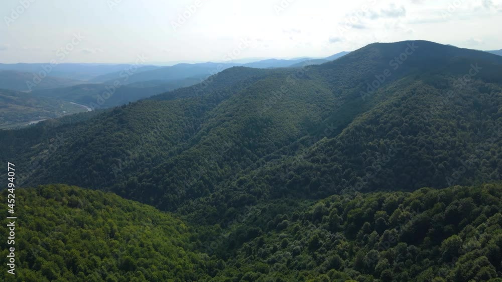Сinematic aerial view of the endless mountains and forests of southern Slovenia. Drone flying through the forest Сinematic aerial view of the endless mountains and forests of southern Slovenia. Drone flying through the forest