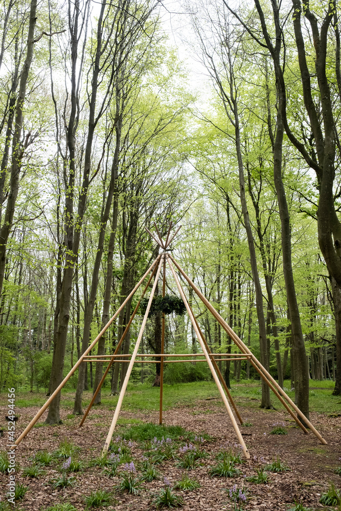 Wooden structure with wreath for a woodland naming ceremony. Wooden structure with wreath for a woodland naming ceremony.
