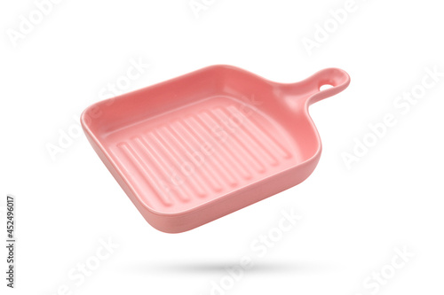 Classic ceramic casserole dish with handles on white background