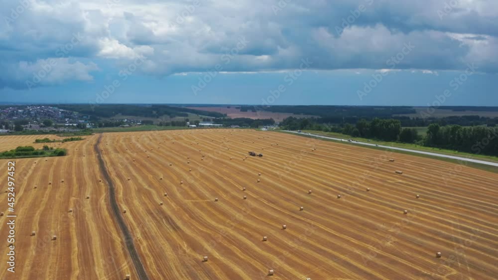 Endless Siberian agricultural fields. View from the drone from under the clouds. Endless Siberian agricultural fields. View from the drone from under the clouds.