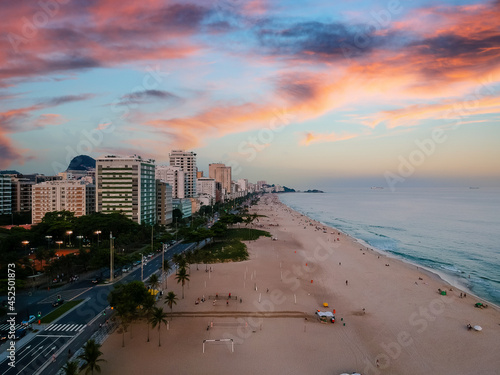 Aerial view of Ipanema beach during sunset, sun with clouds photo