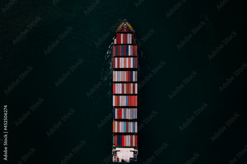 container ship transporting large cargo logistic import export goods internationally worldwide including Asia Pacific and Europe, industry business service transportation by container ship in sea .
