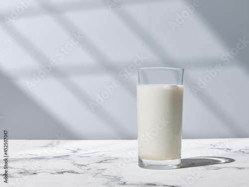 Glass of milk on the kitchen table
