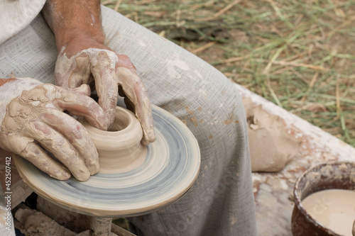 hands of a potter,pottery