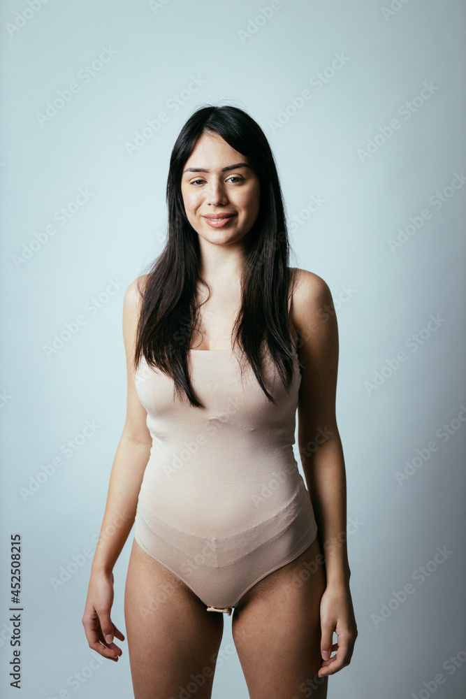 Beautiful girl posing in studio for a Beautiful girl posing in studio for a