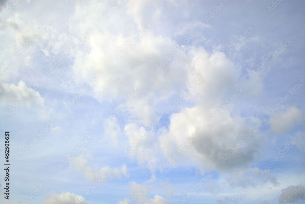 Naklejka premium clouds in a clear sky