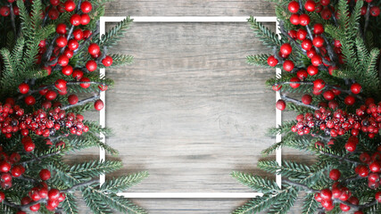 Christmas Winter Holiday Evergreen Branches and Red Berries with White Empty Square Frame Template Over Wood Background Texture with Copy Space