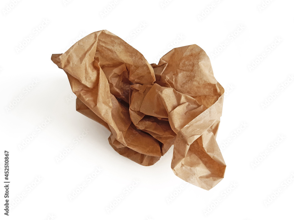 Piece of crumpled brown packing paper on white background. Aerial view of isolated kraft paper sheet. Protection and packaging material Piece of crumpled brown packing paper on white background. Aerial view of isolated kraft paper sheet. Protection and packaging material