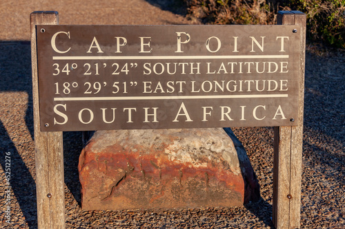 Inscription on the information stand about the geographical coordinates of the Cape of Good Hope in southern Africa. photo