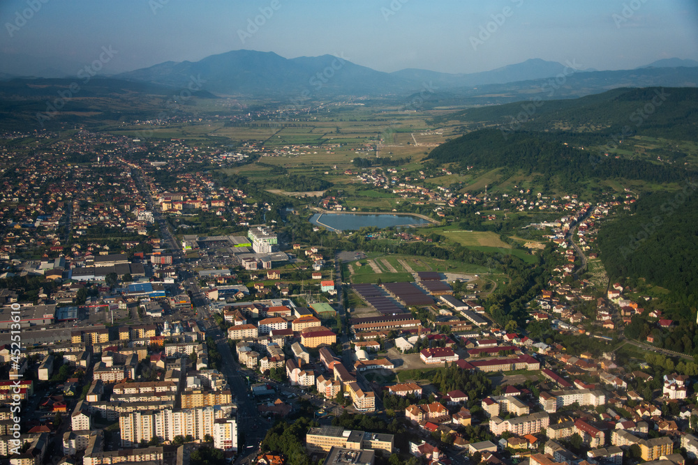 panoramic view over the city of Bistrita, Romania, August, 2020 ,view from the plane,The Lake,august 