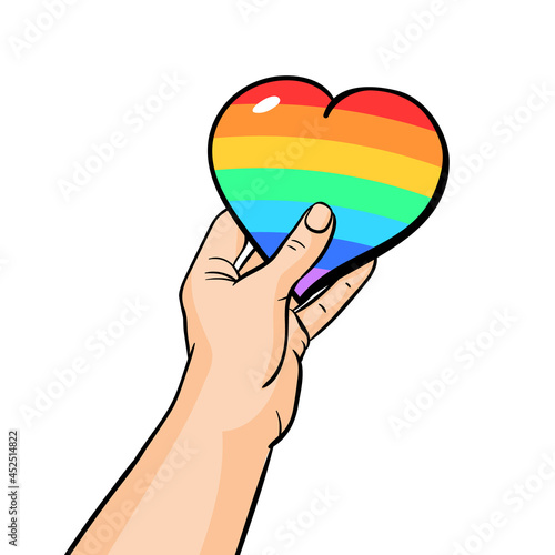 International day against homophobia. Hand with lgbt holding colorful rainbow heart.