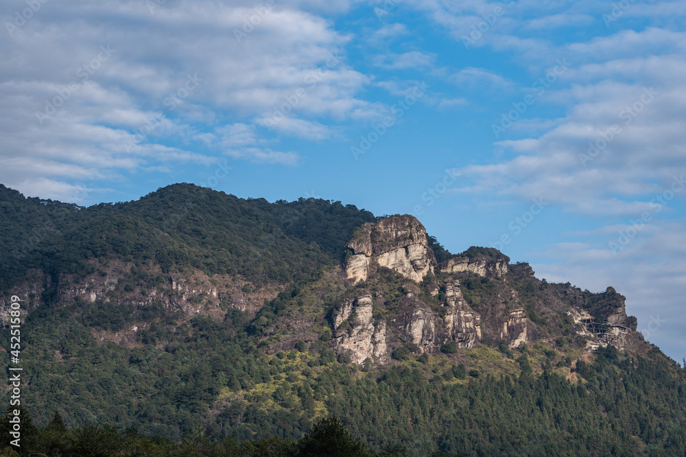 Blue sky and white clouds, all kinds of stones and plants on the mountain Blue sky and white clouds, all kinds of stones and plants on the mountain