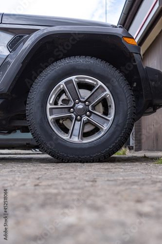 Wallpaper Mural Car wheel and tire on the road Torontodigital.ca