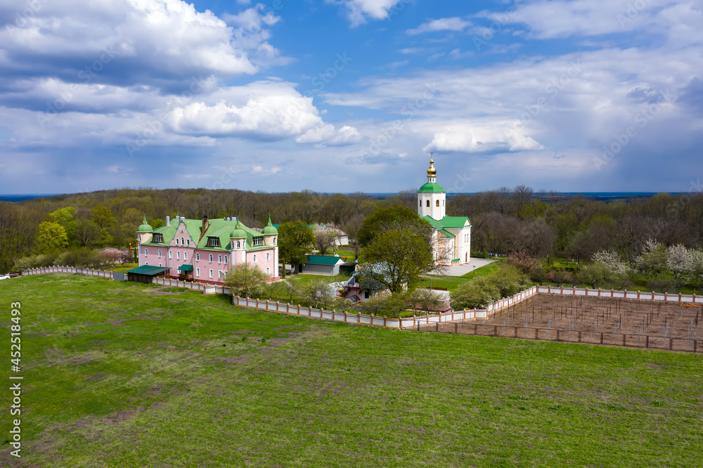 The Holy Trinity Motroninsky Monastery. The village of Melniki Cherkasy region Ukraine aerial view