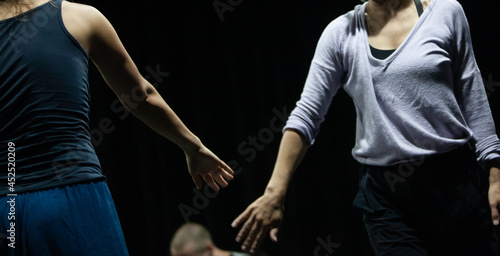 couple dancers contact hands in contact improvisation performance © etitov