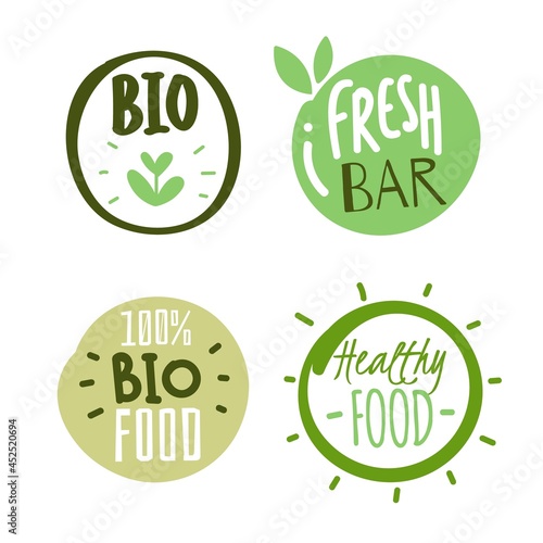 Natural products logo stickers. Organic fresh food labels with text and leaves. Eco and bio circle hand drawn packaging tags, green healthy round badges, vegetarian pure emblem vector set