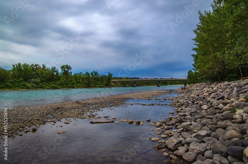 Cloudy Sky Over A Summer Bow River