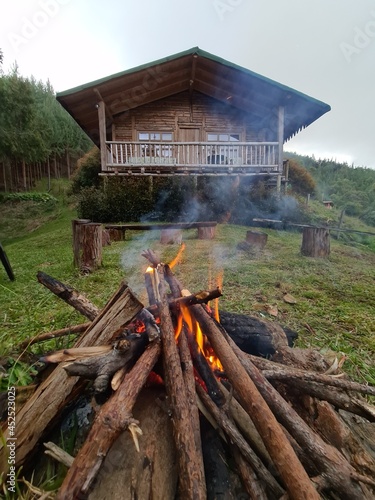 Landscape with farm and campfire. Colombia.  photo