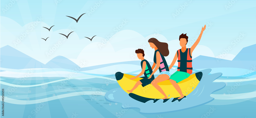 Beach activities on tropical resort, family riding on inflatable banana on sea. Mother, father and son leisure, extreme recreation sport during vacation near ocean. Summer recreation, pastime at sea