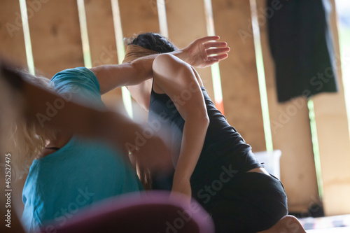 several dancers move in contact improvisation performance