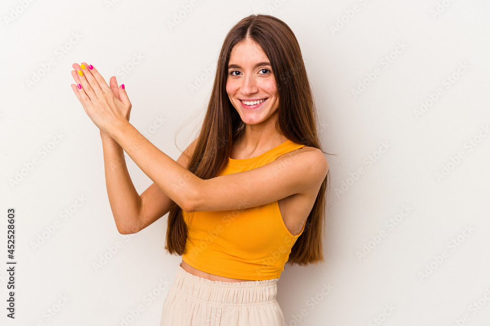 Young caucasian woman isolated on white background feeling energetic and comfortable, rubbing hands confident. Young caucasian woman isolated on white background feeling energetic and comfortable, rubbing hands confident.
